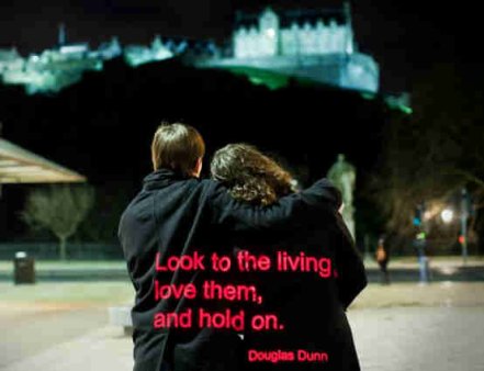 Projected onto Edinburgh Castle, & John and Becky (who's wearing Anna's coat). Image: Chris Scott.